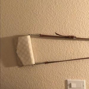 Super cute white and tan shoulder bag